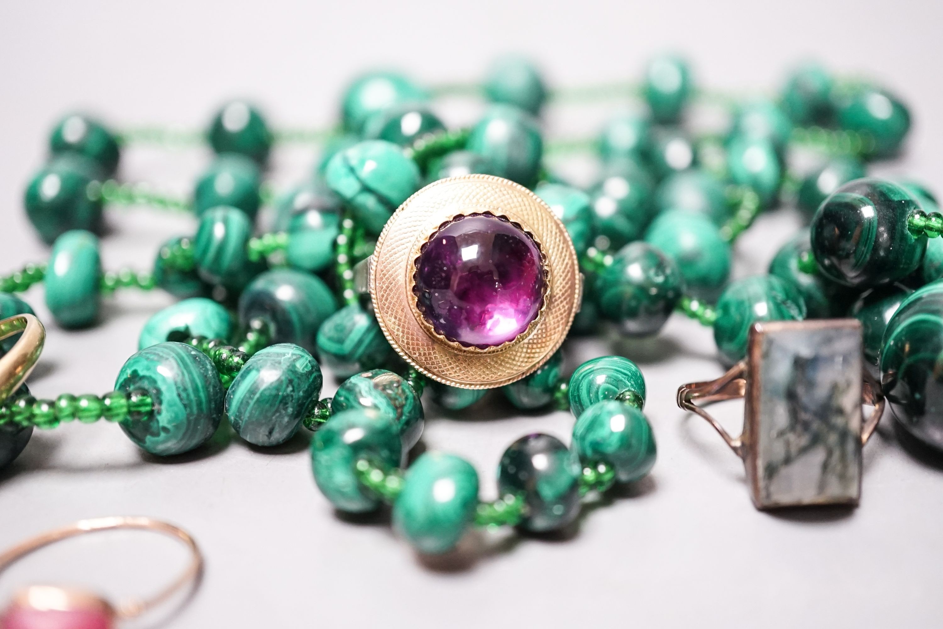 A cabochon amethyst ring (adapted), an 198ct gold shank, 4.4 grams and mixed jewellery including malachite necklaces, rings, bangle etc.